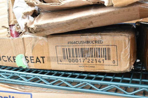Cardboard box with barcode and text "#164CUSHBUCRED" on a green epoxy wire shelf. Box condition: scratch and dent.