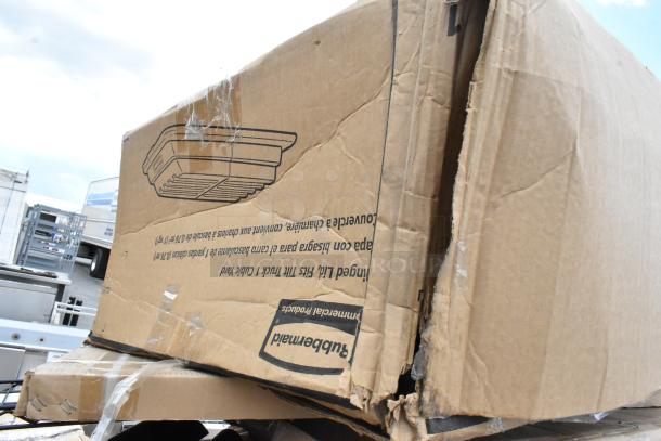 Cardboard box containing 32 brand new scratch and dent items, including Regency and Steelton shelving, with visible packaging wear.