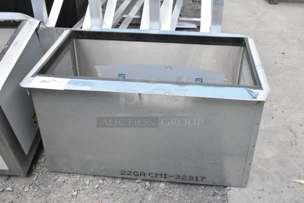 Stainless steel commercial drop-in ice bin, marked with "22GA CNI-32317," in excellent condition, rectangular shape.
