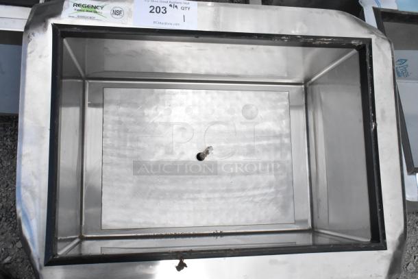 Brand new Regency 600IB2418CP stainless steel drop-in ice bin with cold plate; minor scratches visible.