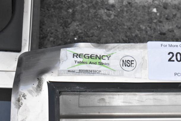 BRAND NEW SCRATCH AND DENT! Regency 600IB2418CP stainless steel ice bin with cold plate, minor scratches, model label visible.