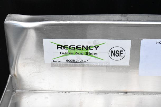 Brand new Regency 600IB2124C7 stainless steel commercial ice bin with cold plate, visible scratch and dent, no legs.