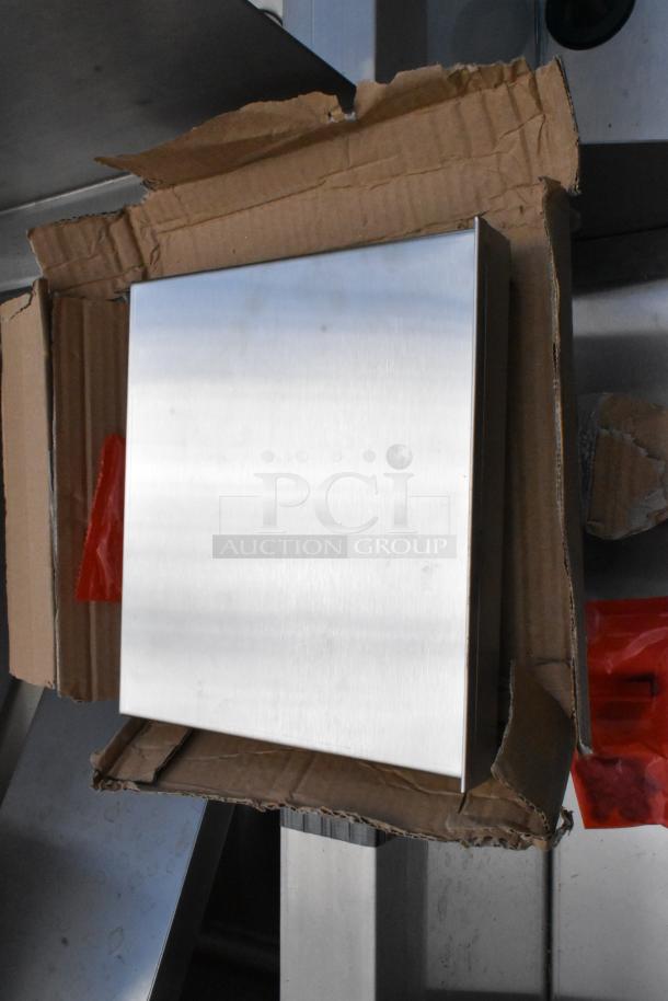 Brand new Regency 600DIIB1812 stainless steel commercial drop-in ice bin with cold plate, in box, scratch and dent condition.
