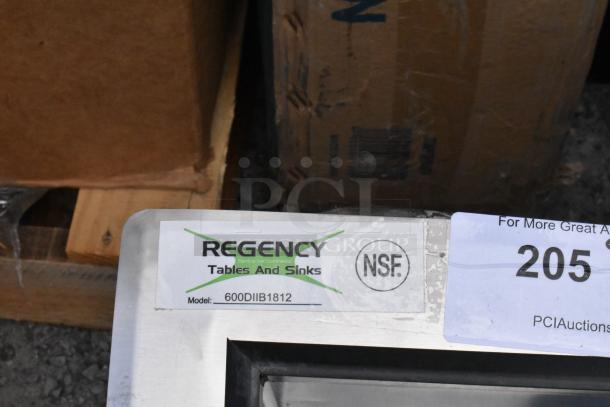 BRAND NEW Regency 600DIIB1812 stainless steel commercial ice bin with cold plate, minor scratches, NSF certified label visible.