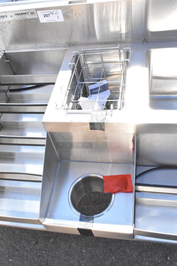 BRAND NEW Regency 600CSL2960S 60" stainless steel cocktail station with built-in liquor display rack. Scratch and dent condition.