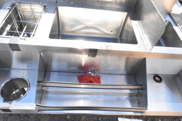 Regency 600CSD2960S stainless steel cocktail station, 60" with drainboard, brand new scratch and dent, visible utility racks.