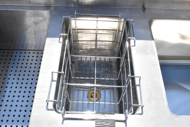 Brand new, scratch and dent Regency 600CSD2960S 60" stainless steel cocktail station with drainboard, visible rack feature.