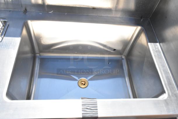 BRAND NEW Regency 600CSD2960S 60" stainless steel cocktail station with drainboard, slight scratches visible.
