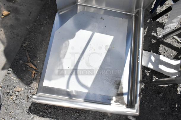 Brand new Regency 600CDT24R 16 gauge 2' clean dish table with right drainboard, minor scratches visible, stainless steel.