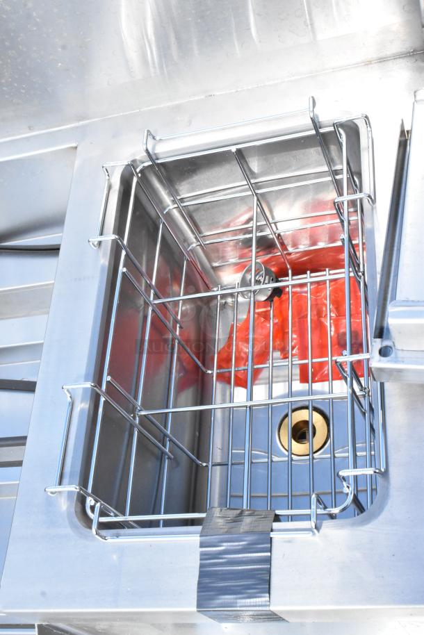 Brand new Regency 600CSLD2972S stainless steel cocktail station with liquor display rack and drainboard, scratch and dent.