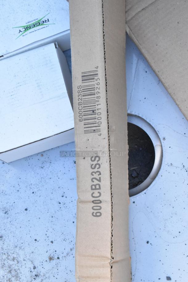 Regency 600S22323224 stainless steel 2 bay sink with dual drain boards, brand new scratch and dent condition.