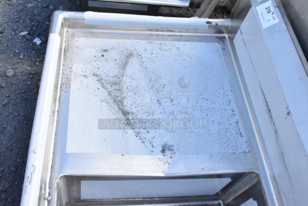 Brand new Regency 600S22323224 stainless steel 2 bay sink, dual drain boards, scratch and dent, visible dirt marks.