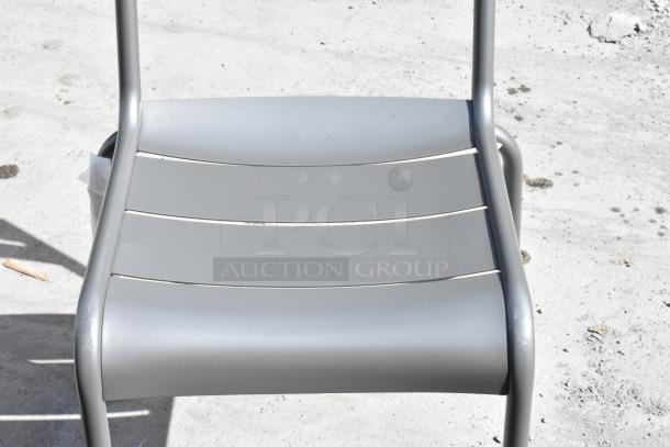 Brown metal outdoor patio chair, dining height, scratch and dent condition. Brand new, 23 available.