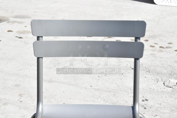 Brown metal outdoor dining height patio chair, new with minor scratches. Durable design, ideal for patio use. Auction lot of 23.