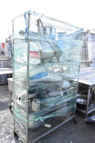 Chrome finish 5-tier wire shelving unit with poly bins, stock pot, Pelouze scale, China cap strainer, and lids. Buyer dismantles.