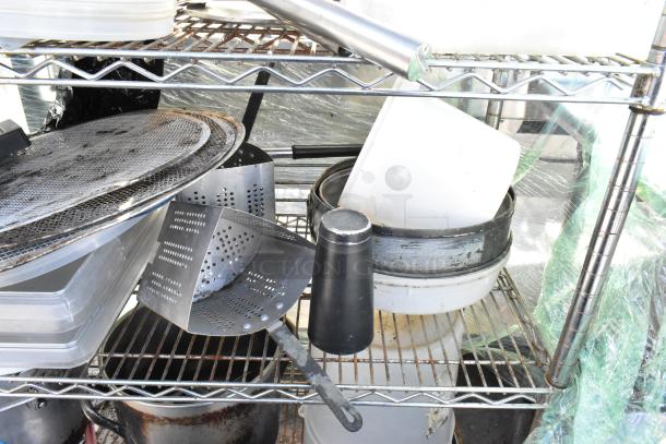 Chrome finish 5-tier wire shelving unit with contents including poly bins, stock pot, Pelouze scale, china cap strainer, lids. Buyer to dismantle.