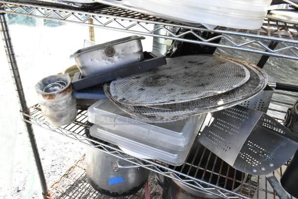 Chrome finish 5-tier wire shelving unit with poly bins, stock pot, Pelouze scale, and kitchen tools. Buyer must dismantle.