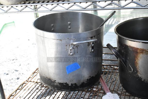 Chrome finish 5-tier wire shelving unit with stock pot, showing wear. Includes poly bins, Pelouze scale, and China cap strainer.