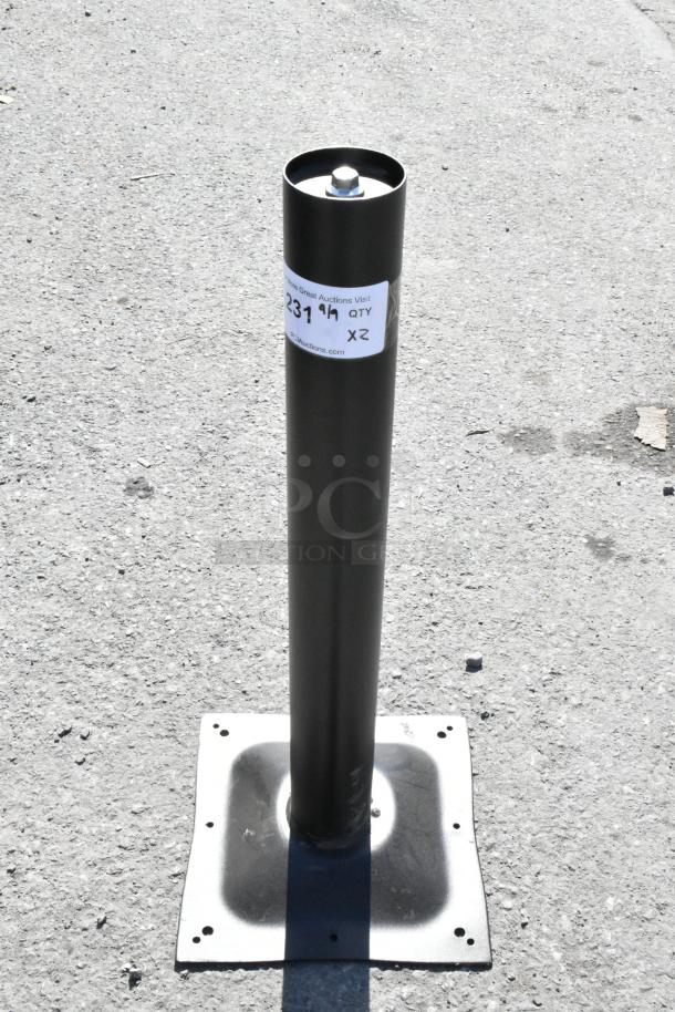 Black metal table base column, cylindrical with square base, new condition. Includes quantity label indicating two units.