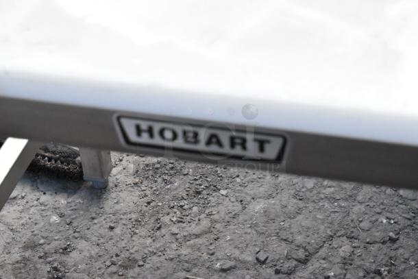 Hobart HRT5 stainless steel commercial roller conveyor wrapping station, model HRT5. Features durable construction.