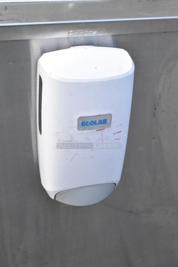 QualServ stainless steel portable sink, commercial single bay with casters. Features Ecolab dispenser. Good condition.