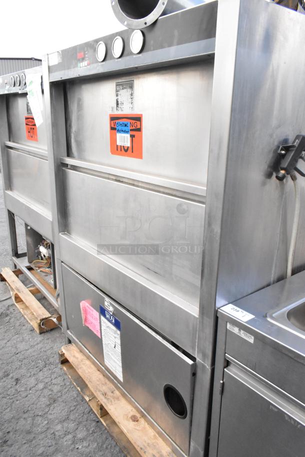 Douglas SD-20-E-480/3 stainless steel pot and pan washer, 480V, 3 phase, with warning labels, on a pallet.