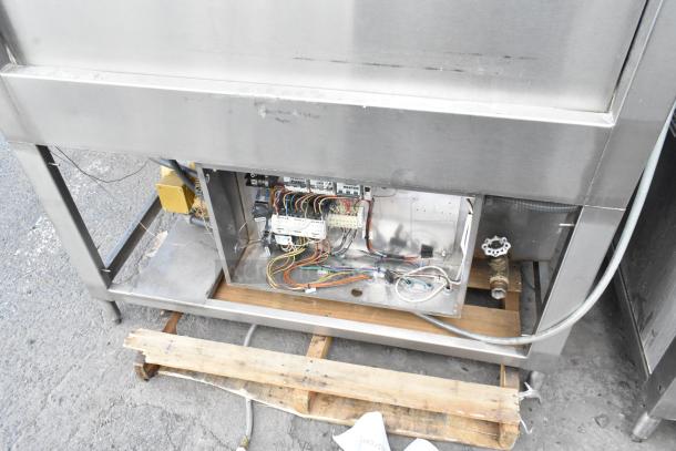 Douglas SD-20-E-480/3 commercial pot and pan washer, stainless steel, 480 volts, 3 phase, with visible wiring and components.