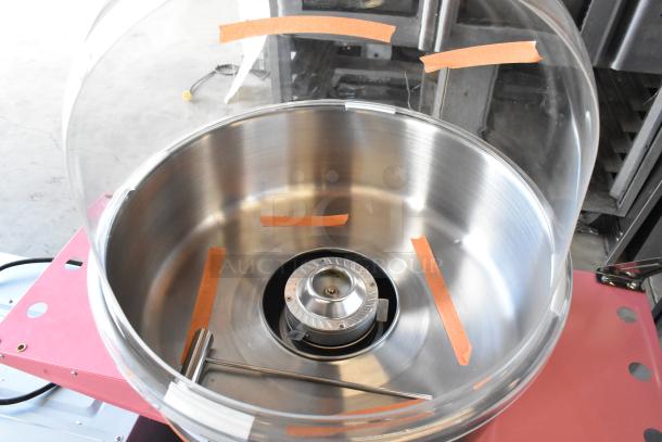 Brand new Carnival King 382CCM21CT metal cotton candy machine with 21" stainless steel bowl and floss bubble. Scratch and dent condition.