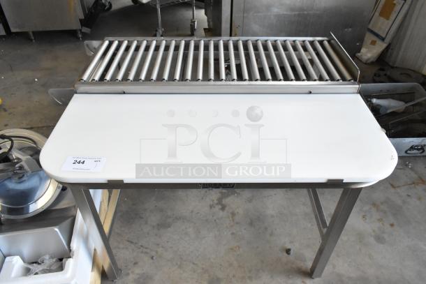 Hobart HRT5 stainless steel roller conveyor wrapping station, pristine condition, with labeled auction tag.