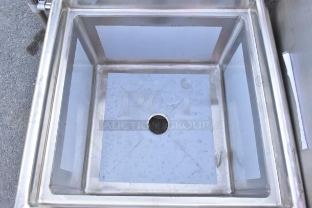 BRAND NEW Regency 600S12424 stainless steel single bay sink, no legs, visible scratches and dents.