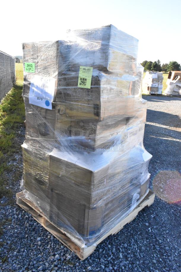 Pallet of 28 scratch and dent items wrapped in plastic, includes cups and plates. Tags show lot info and condition, "SKID 2 OF 2".