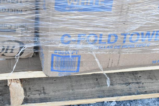 Pallet of C-fold towels with barcode #500CFT, wrapped in plastic. Scratch and dent condition. Made in USA.