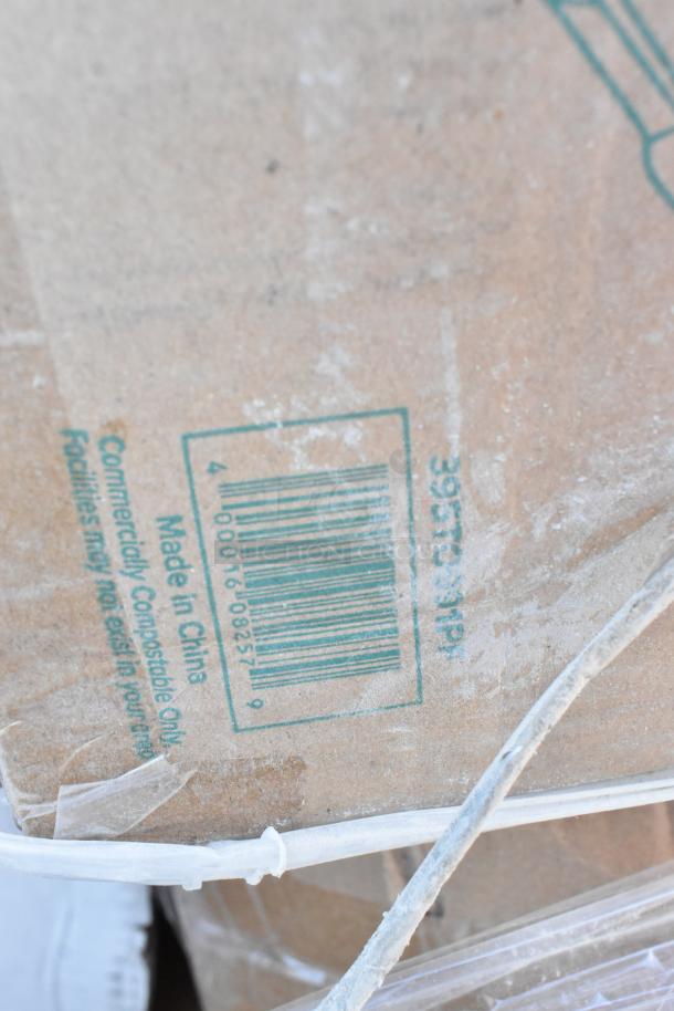 Box showing barcode and "Made in China" label on cardboard packaging, indicating commercially compostable items.