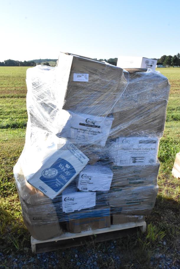 Pallet of 28 mixed new scratch and dent items, including trash bags, paper towels, cups, and spoons, in wrapped boxes.
