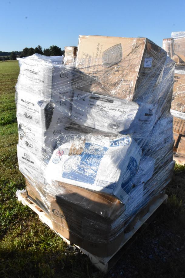 Stack of 28 scratch and dent boxes including trash bags, paper towels, cups, and cutlery packs on a pallet, shrink-wrapped.