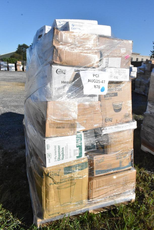 Pallet of assorted scratch and dent items including boxes of trash bags, plastic forks, cold cups, napkins, and to-go containers, wrapped in plastic with visible label "PCI AUG25-47 876".