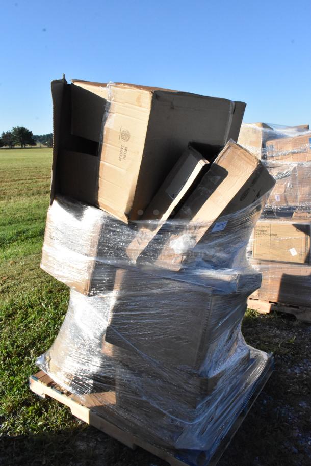 Stack of brand new items in cardboard boxes wrapped in plastic on a pallet. Includes bins, mop bucket, more.