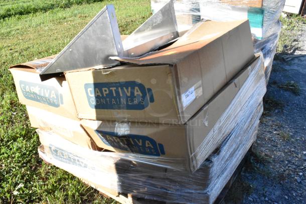 Pallet with Captiva Containers boxes, including new stainless steel wall shelf, scratch and dent condition.