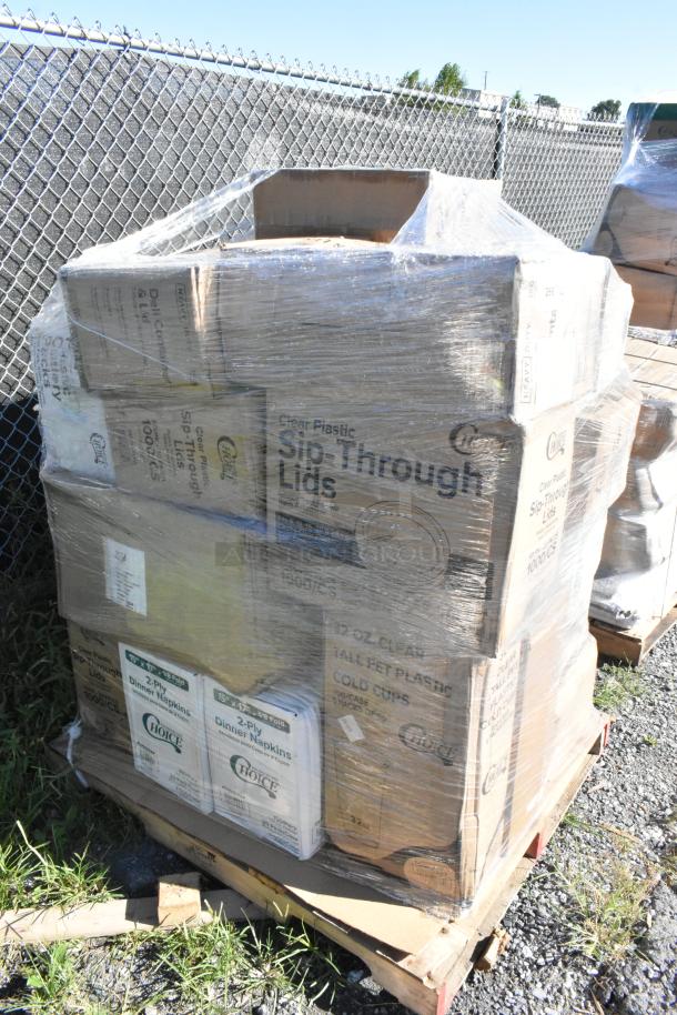 Pallet of 23 new scratch and dent items including cold cups, sip-through lids, napkins, and containers, wrapped in plastic.