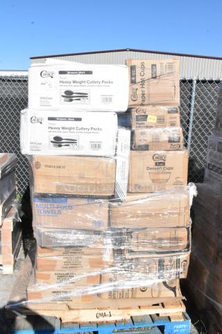 Pallet of 35 brand new choice scratch and dent items, including cutlery packs, cups, paper towels, wrapped in plastic.