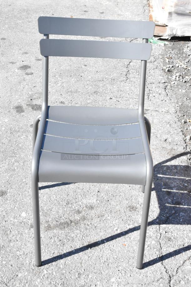 Matte gray aluminum outdoor barstool, Lancaster Table & Seating, powder-coated finish, scratch and dent condition.