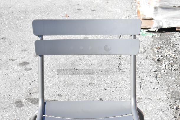 Matte gray powder-coated aluminum barstool by Lancaster Table & Seating. New scratch and dent condition.