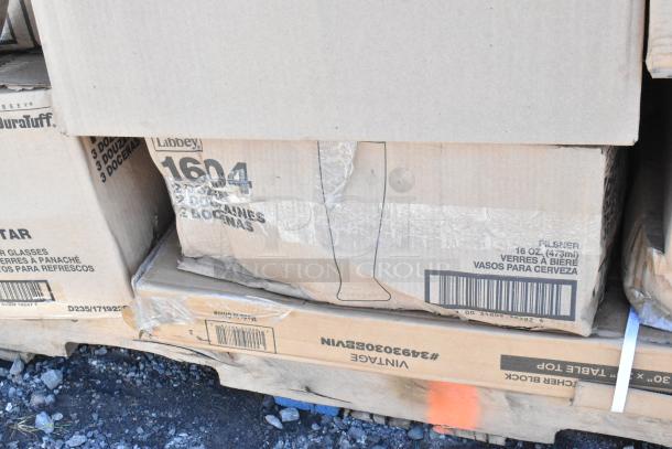 Boxes of brand new Libbey 1604 Pilsner glasses, 16 oz, visible markings indicate 3 dozen per box, slight box damage.