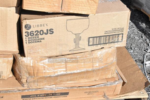 Box labeled "Libbey 3620JS" containing 1 dozen 16 oz cactus margarita glasses, part of a scratch and dent auction.