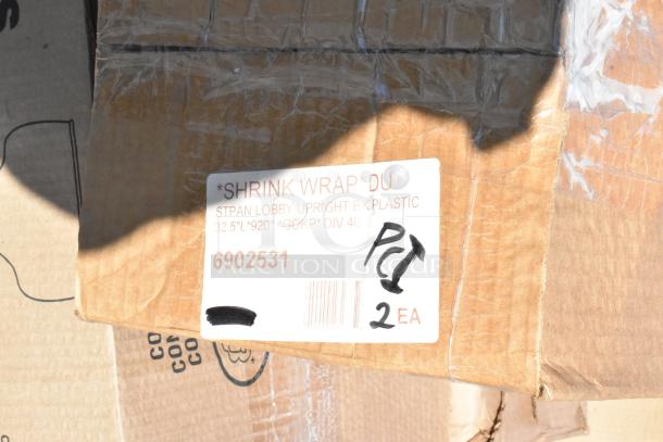 Box with label reading "Shrink Wrap DU," containing plastic lobby upright parts, 32.5 inches long, 2 units marked "PCI."