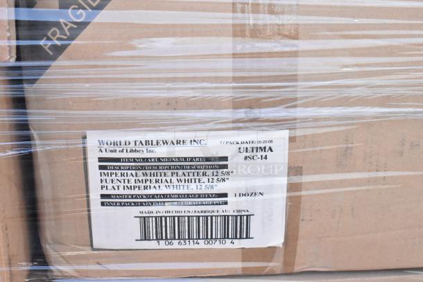 Box of World Tableware Imperial White Platters, 12 5/8", labeled fragile, 1 dozen, made in China, brand new condition.