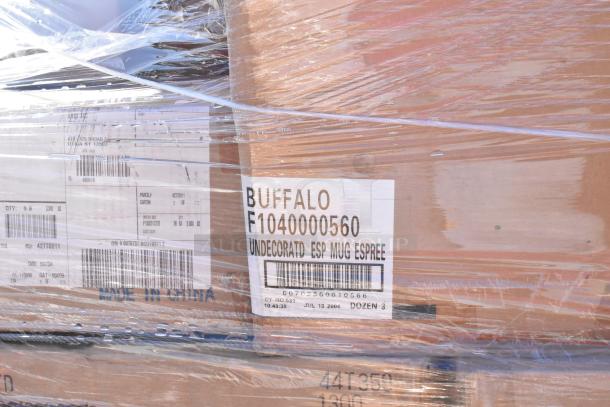 Pallet of Buffalo mugs labeled "Undecorated ESP MUG ESPREE," wrapped in plastic. Condition: Scratch and dent. Made in China.