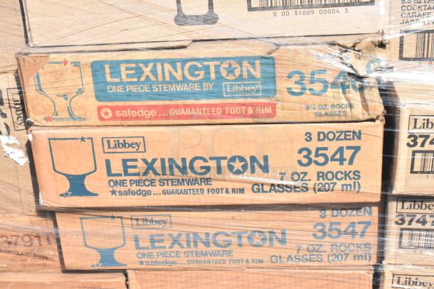 Boxes of Libbey Lexington One Piece Stemware, 7 oz. and 5½ oz. rocks glasses. Marked "safedge… guaranteed foot & rim."