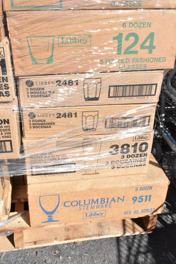 Stack of Libbey glassware boxes, including models 2481 and 3810, and Columbian Stemware 9511. Brand new, scratch and dent.