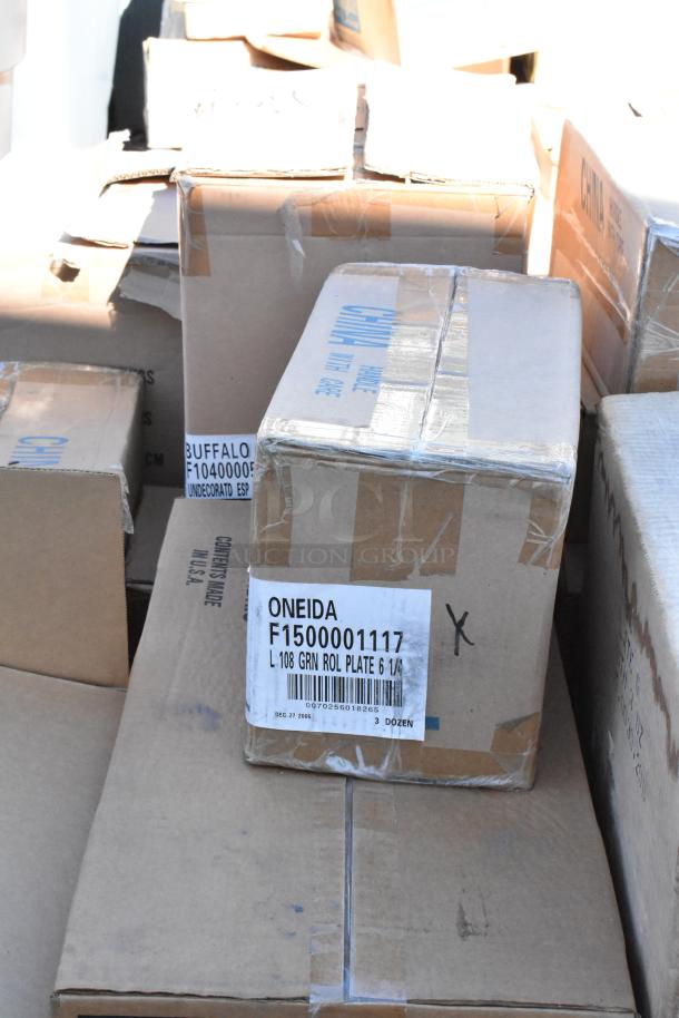 Boxes of dishware including 16 brand new scratch and dent items. Visible label: "Oneida F1500001117."